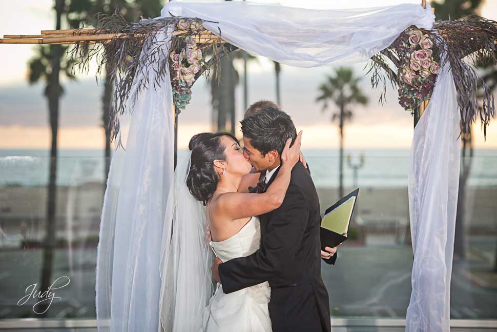 Huntington Hyatt wedding ceremony First Kiss