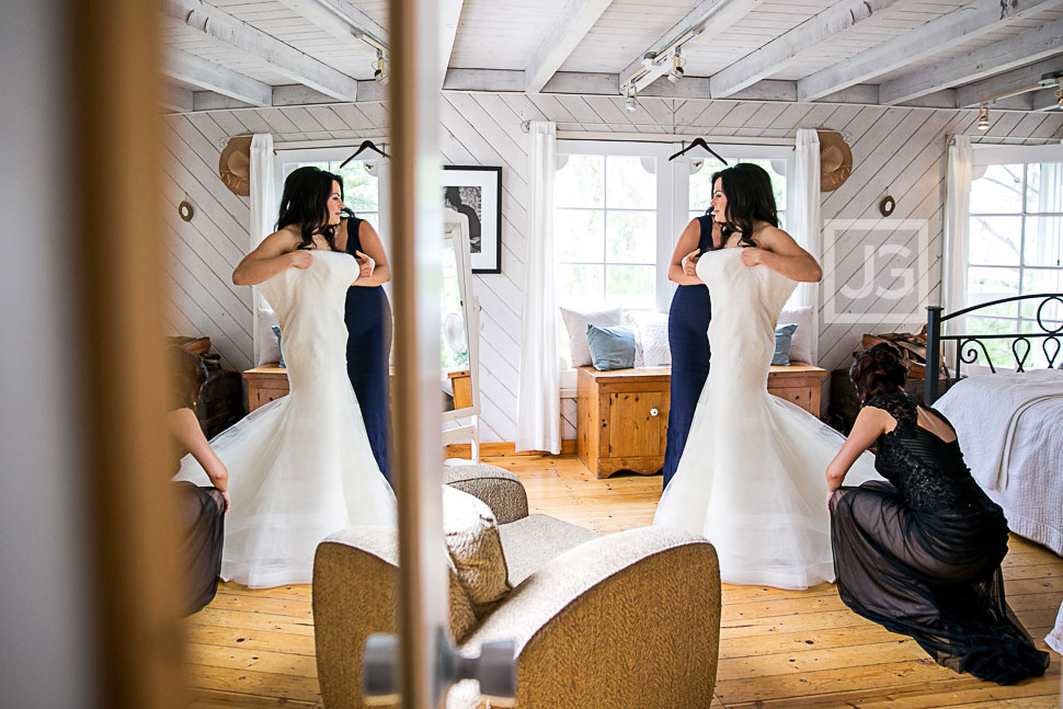 Bride getting dressed at Rancho del Cielo