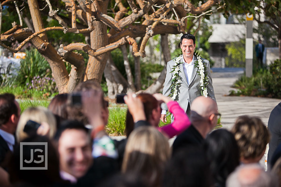 At the end of the aisle our strapping Groom Jason strikes a pose or two 