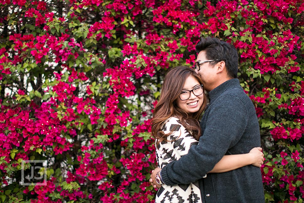 Engagement Photos with Red Flowers