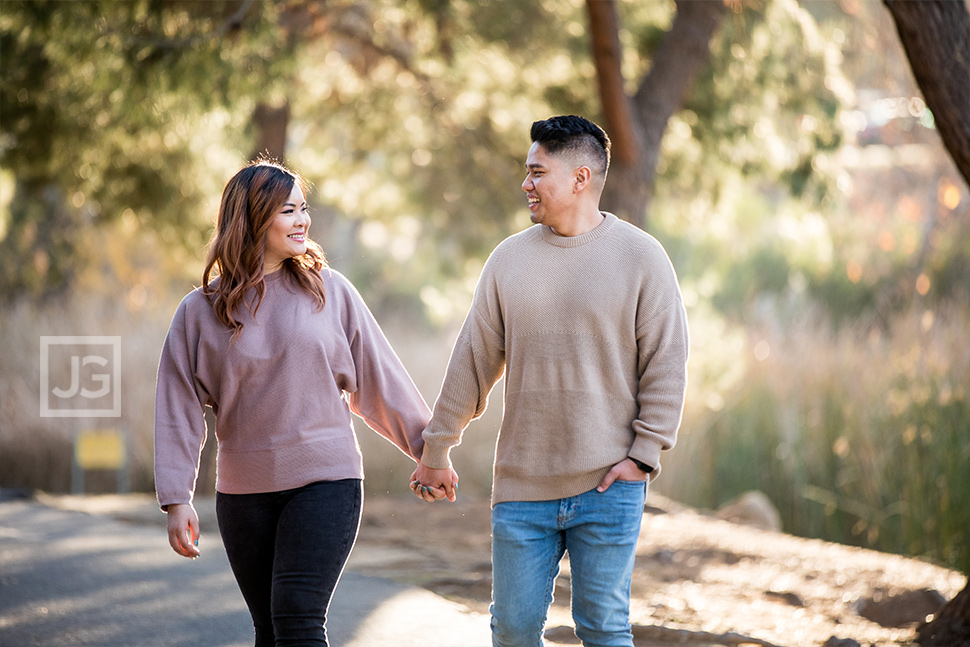 Walking along a Park Trail Engagement Photography