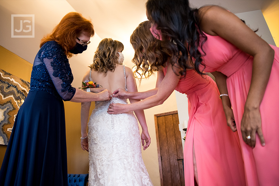 Bride Dress Getting Zipped Up