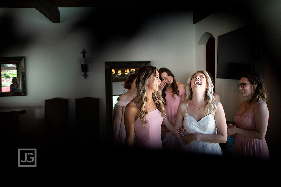 Bride Laughing during Wedding Preparation