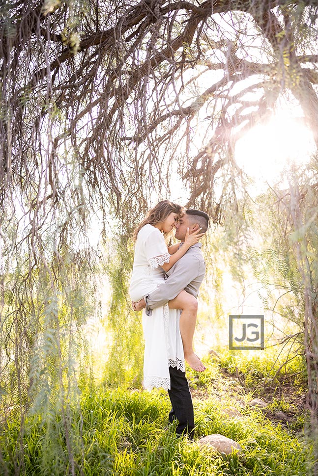 Engagement photo under a tree
