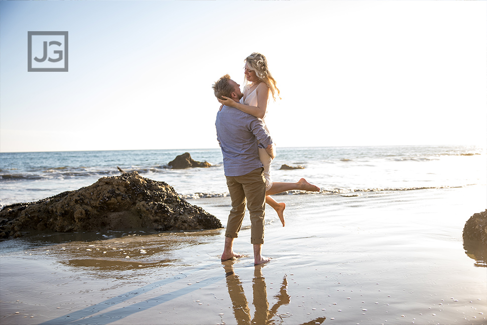 Picking her up engagement photo