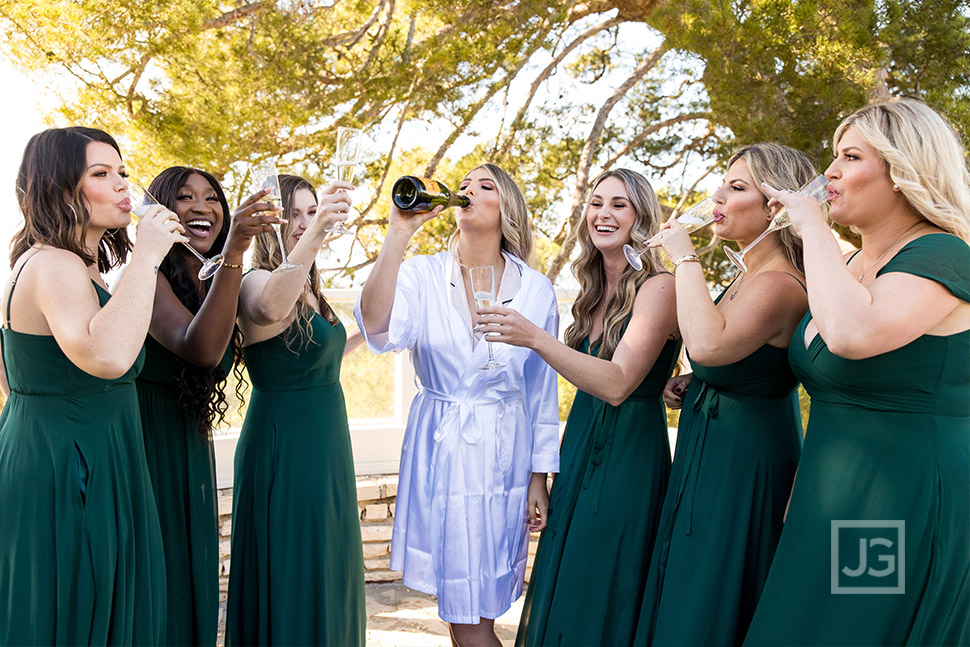 Bride drinking champagne