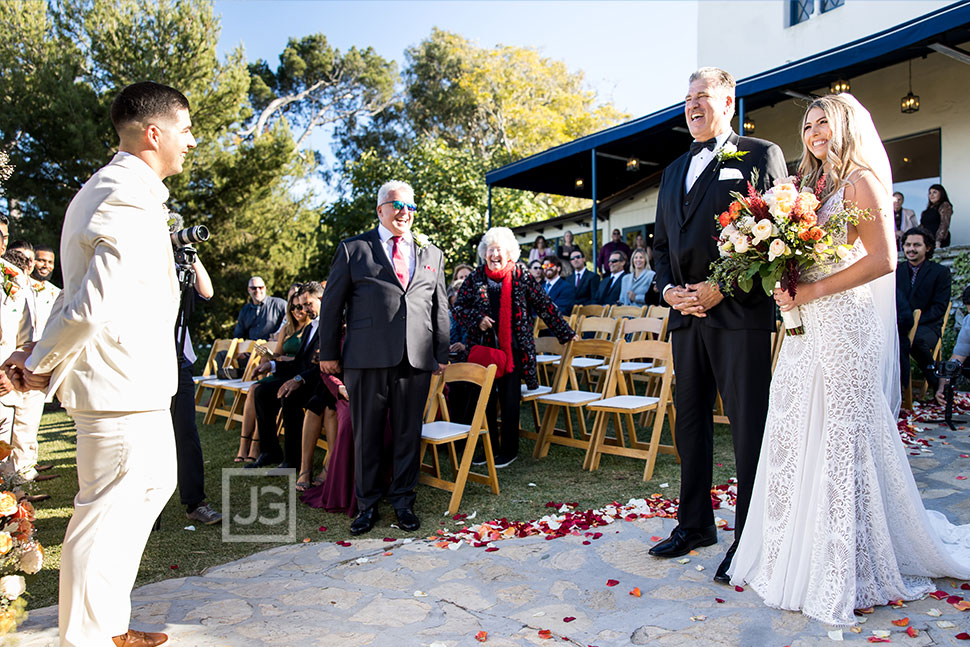 Bride walking down the aisle with her father