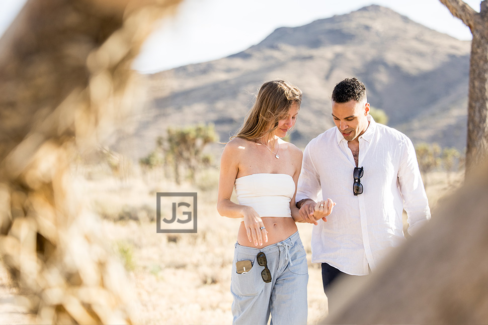 Admiring her ring after proposal