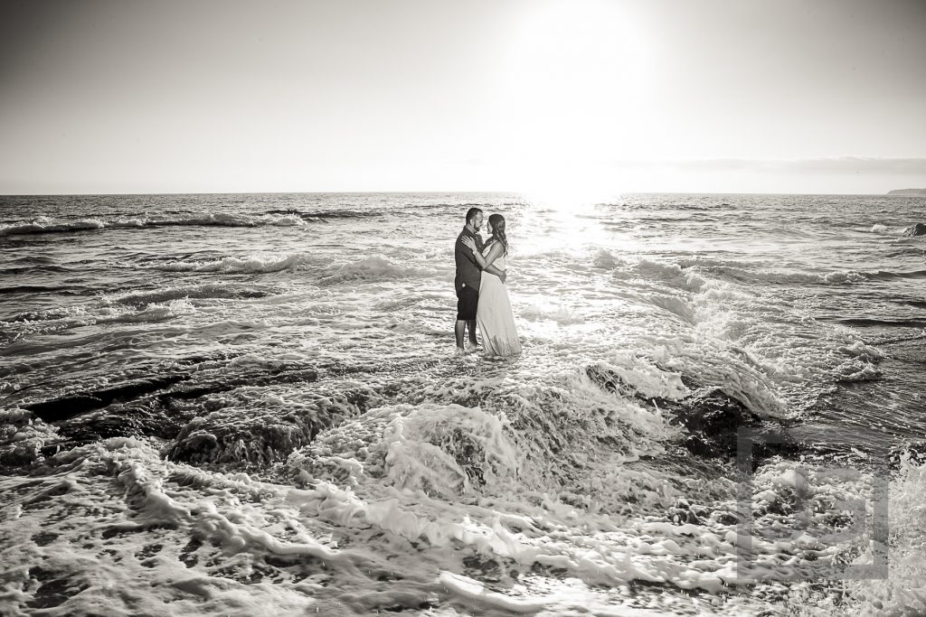 Laguna Beach Engagement Photo with wave