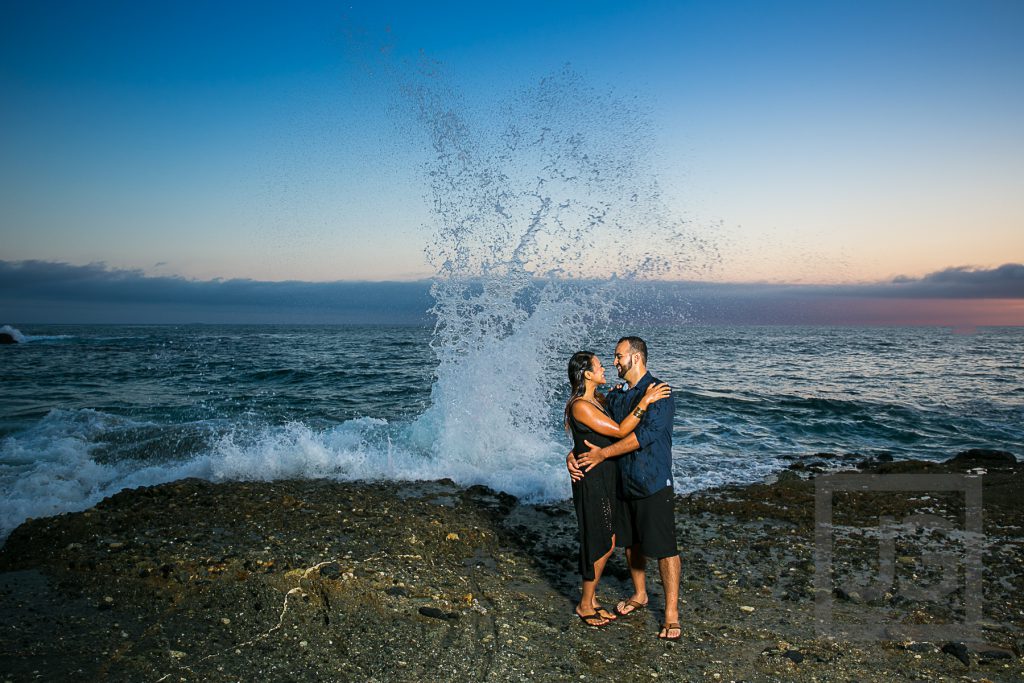 Laguna Beach Engagement Photo with wave and sunset