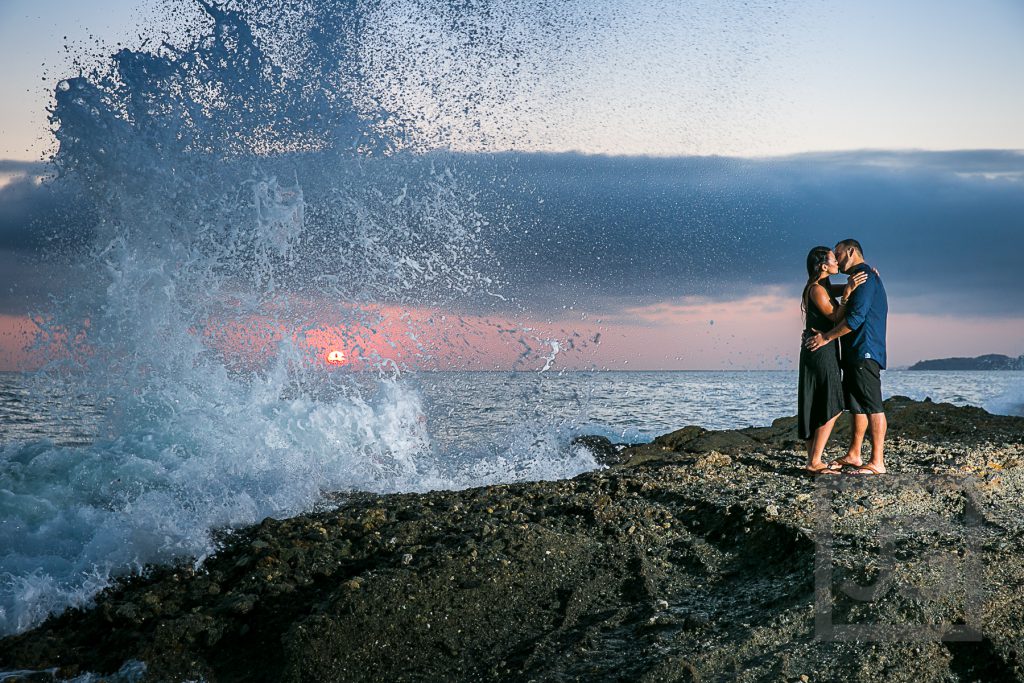 Laguna Beach Engagement Photo with wave and sunset