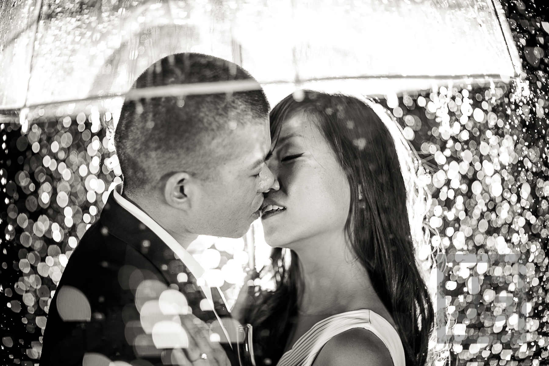 Rain Water Fountain Engagement Photo